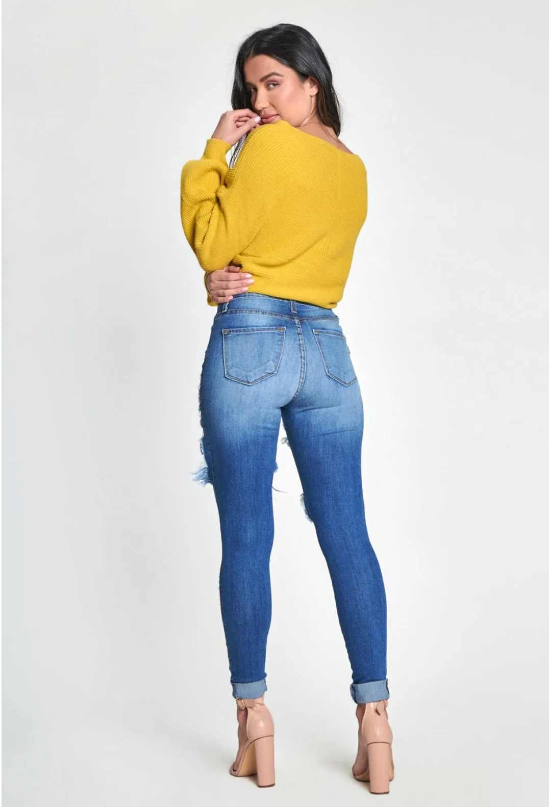 Mid Rise Distressed Skinny Jeans