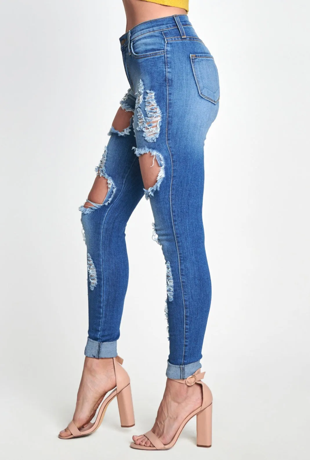 Mid Rise Distressed Skinny Jeans