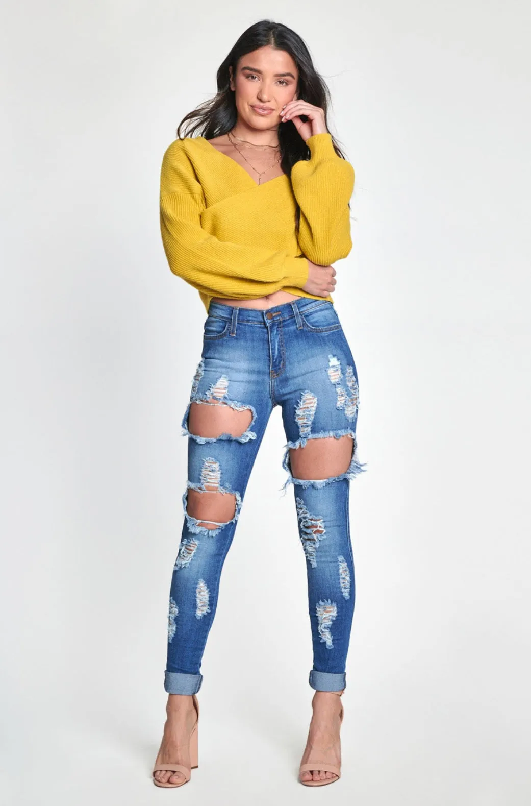 Mid Rise Distressed Skinny Jeans